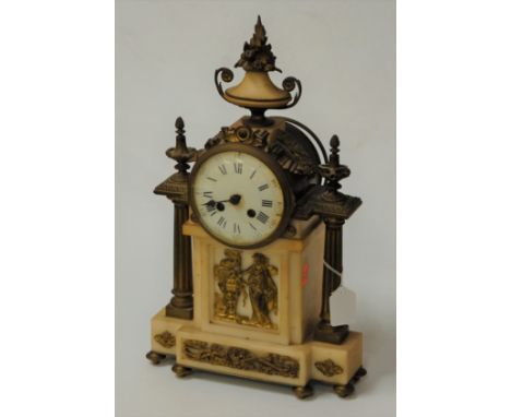 A mid 19th century gilt metal and marble mantel clock having a convex white enamel dial (with extensive damage), an 8 day Fre