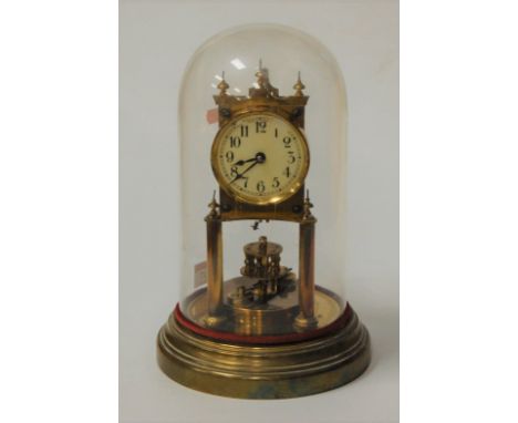 A lacquered brass anniversary clock under glass dome, gross height 28cm