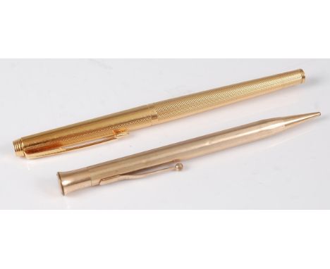 A Parker engine turned gilt metal cased fountain pen, with 14ct gold nib; together with a Schafer's rolled gold propelling pe