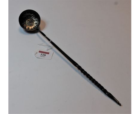 A George III style white metal toddy ladle, the circular bowl repousse decorated with flowers and inset with a George III sty