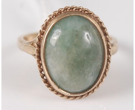 A lady's modern 9ct gold and cabochon jade set dress ring, 5.6g, sponsors mark HB, size Q