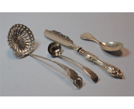 An Edwardian silver sifting spoon, having a pierced shaped circular bowl, with a spirally turned stem and pierced terminal; t