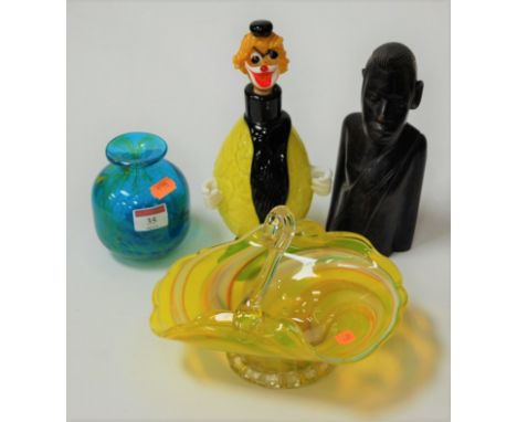 A Venetian glass basket, clown decanter and stopper, together with a Mdina studio glass squat vase, and an African carved har
