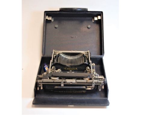 An early 20th century L.C. Smith &amp; Corona portable typewriter