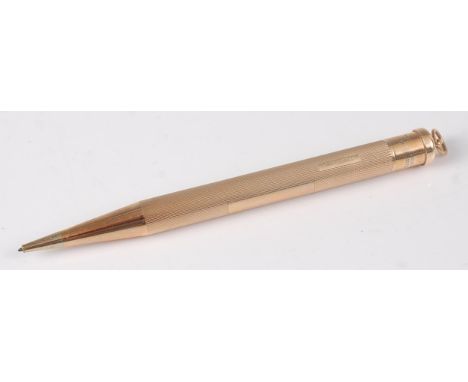 A Lady Yard 9ct gold and engine turned propelling pencil, gross weight 18.8g, in possibly associated Goldsmiths &amp; Silvers