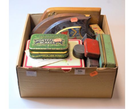 A box of miscellaneous items, to include lithograph printed tins, heraldic shields etc