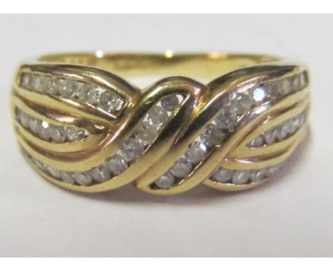 A 9ct gold ropetwist ring set diamonds 4.4gm, size Q