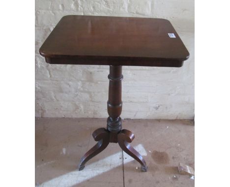 A mahogany pillar and tripod table