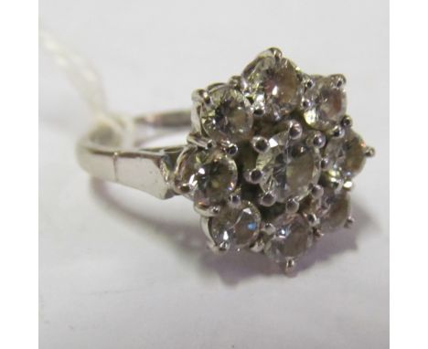 An 18ct gold cluster ring size L 5.88g