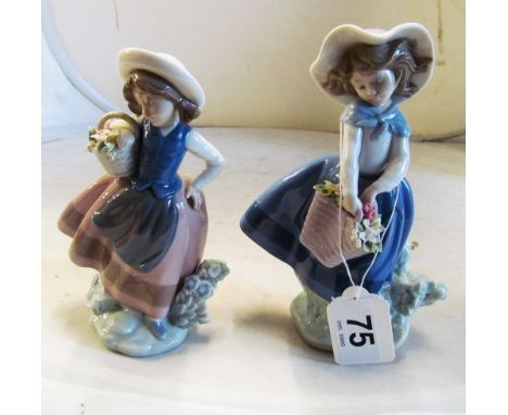 Two Lladro girls with baskets of flowers