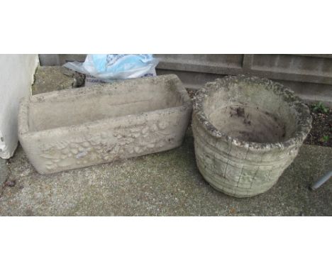 A garden trough and a stoneware planter