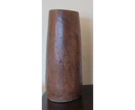 An African pottery drum and a treen open bottomed stand