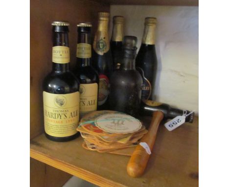 Thatchers Nailsea bottle, Guinness treen gavel and beer mats, Two Thomas Hardy Vintage 1994 ales, two Silver Jubilee ales and