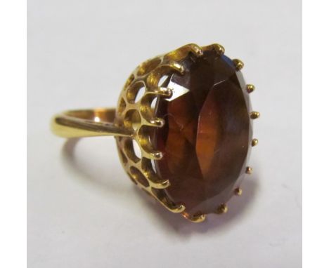 An 18ct and citrine ring 8.4gm in total, size L