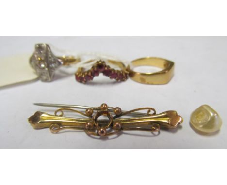 A 9ct gold ring, two 9ct rings and a brooch