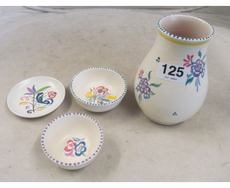Four pieces of Poole Pottery