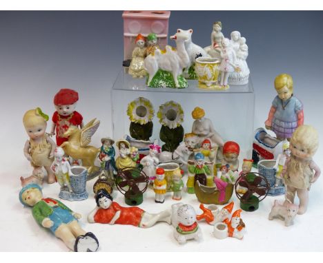 A GROUP OF VINTAGE BISQUE AND OTHER PORCELAIN FIGURES TO INCLUDE JOINTED FIGURES, ANIMALS AND OTHERS.