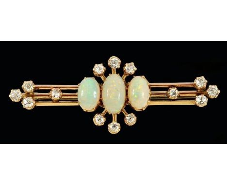 An Edwardian opal and diamond bar brooch, the centre claw set with three cabochon opals within a frame of circular cut diamon