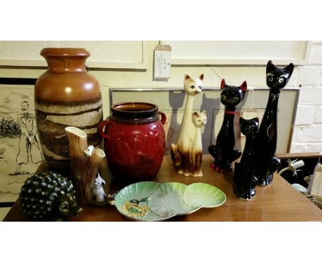 Collection of ceramics inc' 2 West German vases, 4 ceramic cats, Carlton lettuce plate, hedgehog money box, vase.