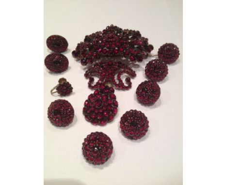 A Collection of Garnet Jewellery, late 19th century, comprising of a corsage pendant brooch, with detachable drop (one stone 