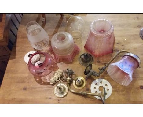 Collection of vintage glass lamp shades (some cranberry flare) with part brass light fixings together with 3 further shades. 