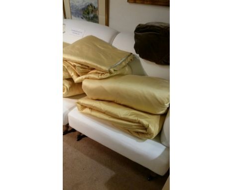 One pair plus one extra curtain silk triple pleat curtains, gold colour each gathered to 99 cm across top (hooks fixed), 252 