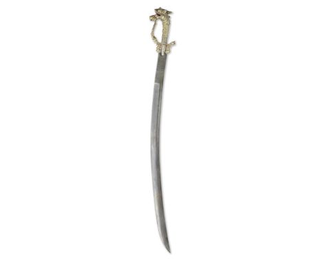 A Singhalese coral-mounted kastane Sri Lanka, 19th Centurythe single-edged steel blade of curved form with octagonal grip, kn