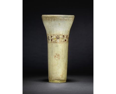 A Mamluk enamelled glass beaker Syria, 13th Centuryof pale yellow glass and flaring cylindrical form with slightly inverted r
