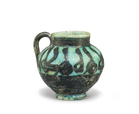 A Kashan silhouette ware pottery jug Persia, 12th Centuryof globular form on a slightly flaring foot, with conical neck and r