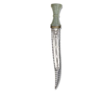 A fine Mughal jade-hilted watered-steel dagger (khanjar) North India, 17th Centurythe slightly curved double-edged watered-st
