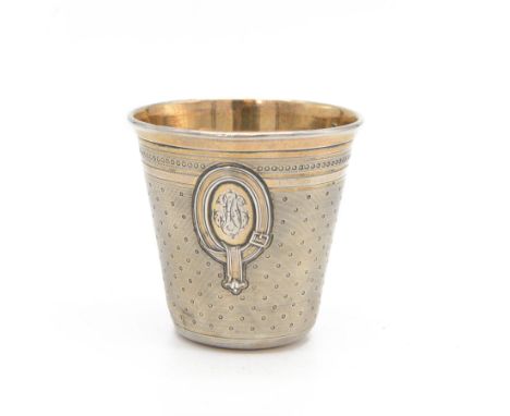 Early 20th century French silver wine tasting beaker, slightly tapered form with gilt interior, the body decorated with engra