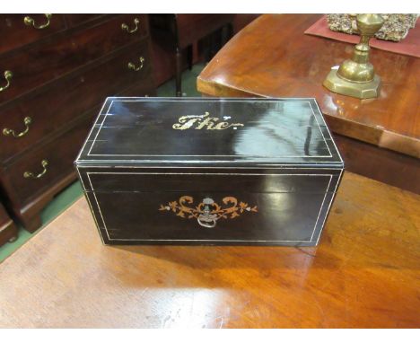 A French ebonised tea caddy inlaid with mother of pearl and brass, "The", with key 