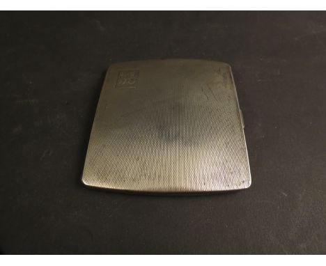 A silver engine turned cigarette case, London 1938, 82g