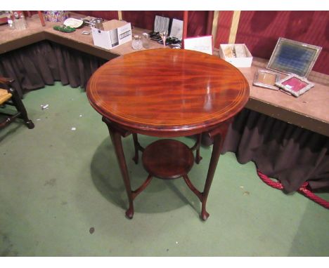 An Arts & Crafts inlaid mahogany two tier lamp table in the manner of "Liberty & Co" 