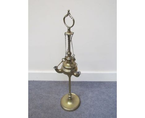 A brass Scandinavian vegetable oil lamp
