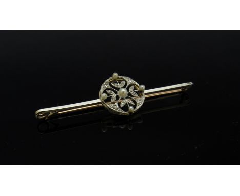 A gold tie pin with pearls and diamonds in original box 