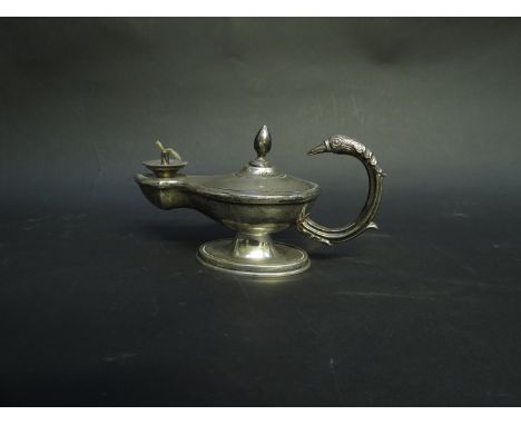 A silver ornate Aladdin lamp oil burner with swan head handle, Birmingham 1911, 136g