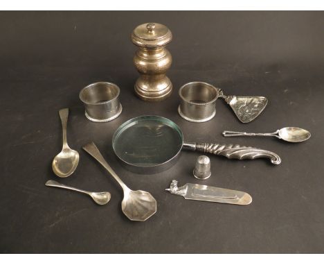 A quantity of silver items including pepper mill, two silver napkin rings, magnifying glass, horse head page marker, Dutch si