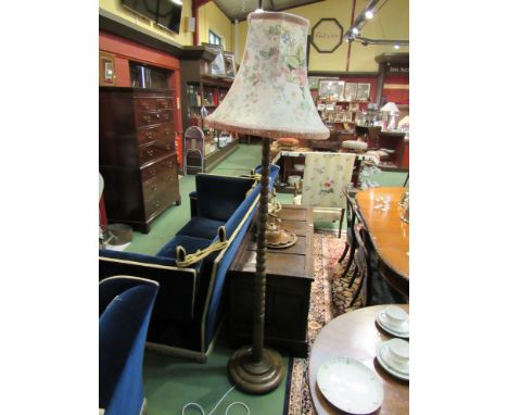 A bobbin turned standard lamp with floral shade 