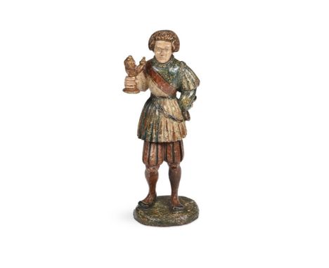A POLYCHROME DECORATED WOODEN FIGUREIN 16TH CENTURY MEDIEVAL STYLE, PROBABLY DUTCH, 19TH CENTURYDepicting a man in breeches h