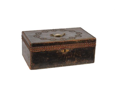 A REGENCY LEATHER AND STUDDED TRUNK  CIRCA 1818 Engraved 'Miss Abel 1818', with paper label for 'J Choat, Trunk, Chest & Box 