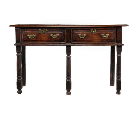 AN OAK DRESSER BASE FIRST HALF 18TH CENTURY 78cm high, 133cm wide, 48cm deep Condition Report: Marks, knocks, scratches and a