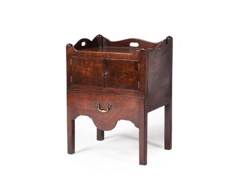 A GEORGE III MAHOGANY BEDSIDE CUPBOARD OR NIGHT COMMODECIRCA 1780The pull out section as a drawer81cm high, 60cm wide, 45cm d