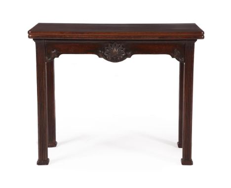 A GEORGE III MAHOGANY TEA TABLEIN THE MANNER OF THOMAS CHIPPENDALE, CIRCA 1770The hinged top supported by a hinged leg73cm hi