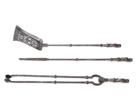 A SET OF THREE LION HANDLED POLISHED STEEL FIRE TOOLS EARLY 19TH CENTURY Each with a heraldic lion handle, the shovel stamped