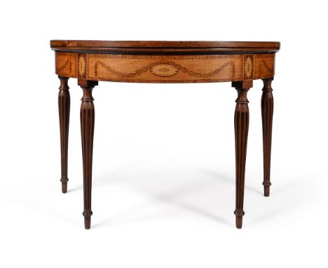 Y A GEORGE III SATINWOOD, TULIPWOOD, MAHOGANY AND MARQUETRY FOLDING DEMI-LUNE CARD TABLE POSSIBLY IRISH, IN THE MANNER OF INC