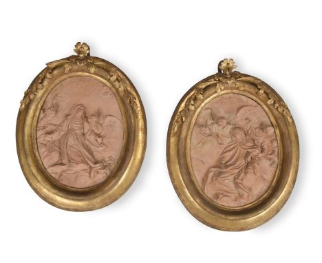 BRIELLO PIÒ (ITALIAN, 1690-1770), A PAIR OF OVAL TERRACOTTA RELIEFS DEPICTING FEMALE SAINTS18TH CENTURYSaint Catherine of Sie
