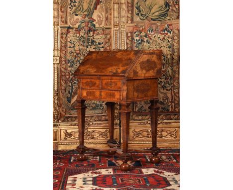 A WILLIAM & MARY WALNUT AND 'SEAWEED' MARQUETRY BUREAU POSSIBLY BY GERRIT JENSEN, CIRCA 1690The fall opening to an arrangemen