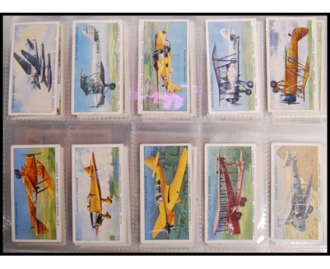 Cigarette Cards: An album of assorted vintage cigarette cards - all full sets. From a large private collection, including cig