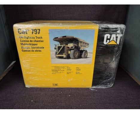 A NZG 1:50 scale diecast, Cat 797 Off-Highway Truck, in original polystyrene packaging and outer box 466